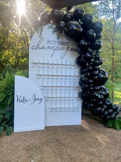 Champagne Walls: How to Pull Off This Trend That Isn't Fizzing Out Arched Champagne Wall, Bridal Shower Ideas Champagne Wall, Champagne Stand Diy, Champagne Wall Balloons, Champagne Arch Wall, Champagne Wall Engagement Party, Arch Champagne Wall, Building A Champagne Wall, Favor Wall Wedding