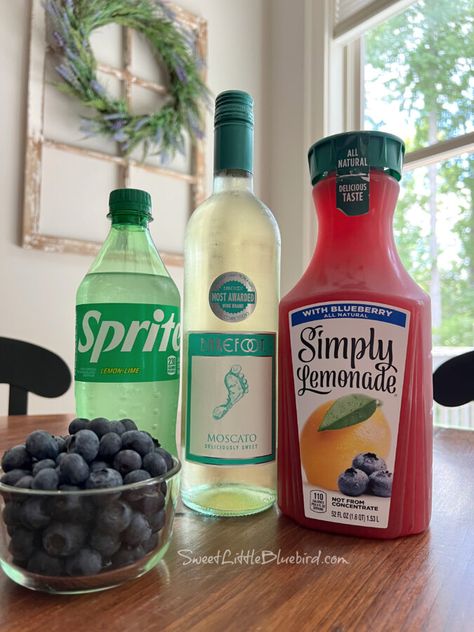 Photo of ingredients to make a Moscato Wine Spritzer - bottle of sprite, bottle of Moscato, blueberry lemonade and a small bowl of fresh blueberries. Spritzer Recipes, Moscato Wine, Wine Spritzer, Blueberry Lemonade, Mixed Drinks Alcohol, Yummy Alcoholic Drinks, Boozy Drinks, Mixed Drinks Recipes, Cocktail Drinks Recipes