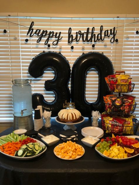 Simple and pretty 30th birthday party snack table and photo back drop Big 30th Birthday Party Ideas, 30th Birthday Bar Ideas, Snacks For 30th Birthday Party, Cheers To 30 Years Decorations, Table Decoration For Men Birthday, Mens 32 Birthday Party Ideas, Simple Party Decorations For Men, Men Bday Party Decorations, 30th Birthday Ideas For Men Non Alcoholic