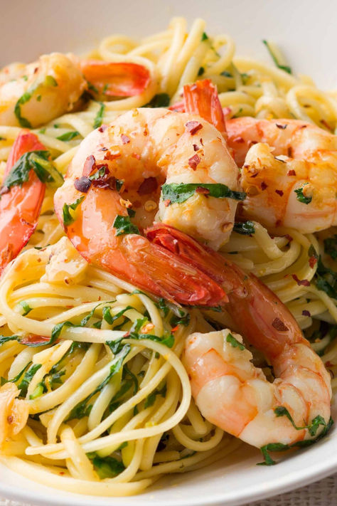 One of the greatest pastas Italy has created is also one of its simplest: the glorious aglio e olio, pasta with just garlic, olive oil and chilli. And yet, it appears you can build on perfection. One of our favourite pasta recipes on taste.com.au is linguine with prawns, which riffs on this classic. Plump king prawns are seared in the oil mixture and a handful of fresh rocket leaves are tossed with the pasta at the last moment. Garlic Prawn Pasta, Olio Pasta, Prawn Linguine, Rocket Leaves, King Prawns, Linguine Recipes, Favorite Pasta Recipes, Aglio E Olio, Linguine Pasta