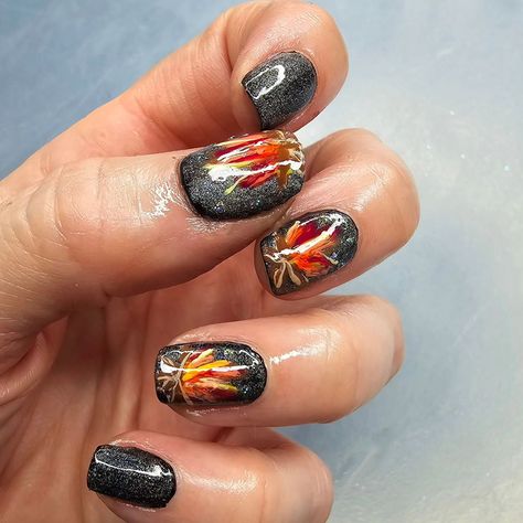 Swipe left to view this bonfire blend tutorial 🔥✨ Nail art by @sugarandspiceandmanis (Lynn) celebrates the end of summer, the close of September, and the fiery beginning of the spooky season tidings. 🍂 Featuring a mix of shades like Maven, Starshine, Basic B* Duo, Wren, Gigi, and Ode to The Poppies, with Gloss Top Coat for that perfect finish. For a pop of orange, Margot or Orangesicle are great options, too! What is your favorite fall tradition? 🌕🔥 . . . . Fall Nail Art / Halloween Nail... Bonfire Nails, Nail Art Halloween, Fall Nail Art, Halloween Nail, Art Halloween, What Is Your Favorite, Fall Nail, Nail Tutorials, End Of Summer