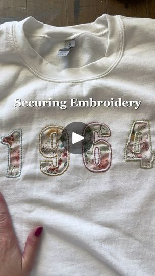 2.3K reactions · 183 shares | How I Secure the Back of My Embroidery on Sweatshirts

Ever wondered how to keep your embroidery neat and secure, especially on clothing? I’m sharing my favorite technique to make sure those stitches stay put and last!

Here’s how I do it:
✔️ First, I apply fusible interfacing to protect the fabric and give extra support.
✔️ Then, I use iron-on hem adhesive for added security.
✔️ Finally, I add a fabric backing and set everything with an iron for a clean, polished finish.

If you want to see the whole tutorial, check out my YouTube for a more in-depth look.

#EmbroideryTips #EmbroideryHacks #HandEmbroidery #EmbroideryProcess #DaisiesAndDukeEmbroidery #DIYEmbroidery #SweatshirtEmbroidery #CraftyTips #SewingHacks #EmbroideryCommunity #StitchingTechniques #sewing How To Protect The Back Of Embroidery, Hand Stitched Sweatshirt Diy, Stitching On Sweatshirt, Reverse Embroidery Sweatshirt, How To Embroider By Hand On Clothes, Embroidery Designs For Sweatshirts, Embroidery Sweatshirt Diy, Embroidery On Sweatshirts, Embroidery Backing