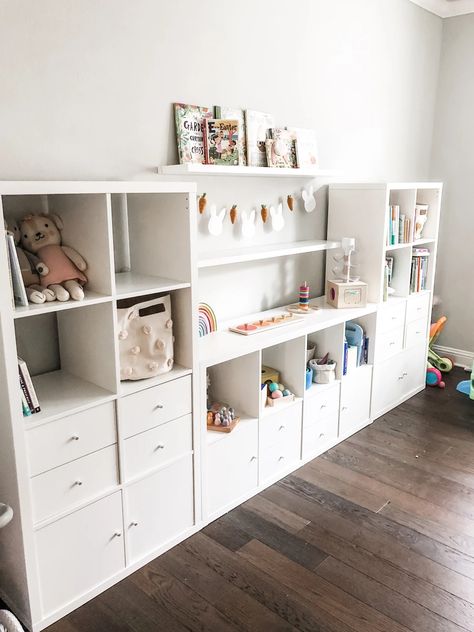 Basement Playroom Storage Ideas, Toy Storage Ideas For Playroom, Playroom Ideas With Storage, Ikea Shelving Playroom, Basement Kid Storage, Wall Unit Storage Ideas, Playroom Storage With Tv, Kids Storage Unit, Playroom Ideas Ikea Storage