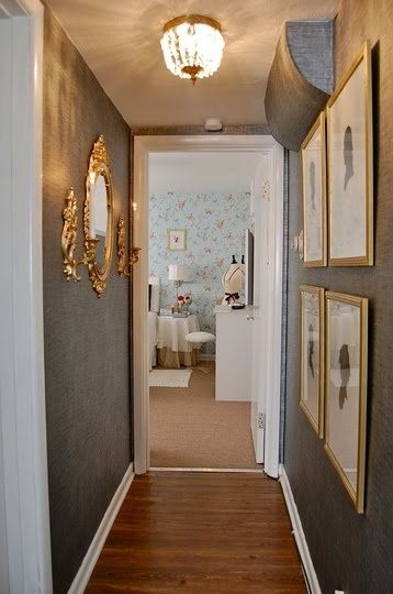 beautiful gray hallway with gold accents Clayton Missouri, Corridor Wallpaper, Gold Hallway, Silver Grey Paint, Narrow Corridor, Small Apartment Therapy, Hallway Gallery, Hallway Gallery Wall, Grey Hallway