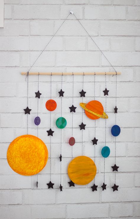 Make your boys room space themed with this cute DIY space mobile craft--takes less than an hour, is inexpensive, and is super fun to make! Space Mobile, Space Crafts For Kids, Mobile Craft, Solar System Projects, Diy Space, Space Activities, Diy Mobile, Space Party, Space Birthday