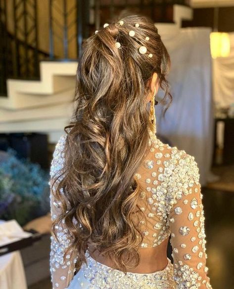 20+ Pearl-Adorned Bridal Hairstyles That You'll Love Wedding Hairstyles With Hair Accessories, Medium Length Hairstyle For Bride, Sangeet Hairstyles For Bride On Gown, Braided Ponytail Hairstyles For Wedding, Hairstyles For Long Hair On Gown, Messy Ponytail Hairstyles Indian Wedding, Hairstyle With Gowns, Pony Tailed Hairstyle Wedding Indian, Saree Braid Hairstyles