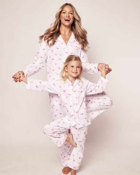 Take a quick trip to paradise in your sleep. Our classic pajama comes with a tropical twist this season, featuring vivid pink flamingos flitting across a white cotton base. These playful and carefree birds will have your imagination taking flight, evoking the memory of sweet summer holidays enjoyed by the sea. This classic pajama set is accented with piping and finished with pearl buttons. The sleepwear is made from the finest quality cotton and blended with just enough inherently flame retardan Pajama Set For Kids, Florida Themed Pajamas, Pajama With Feathers, Petite Plume Pajamas, Floral Pajama Set, Unicorn Kid Pajamas, Luxury Sleepwear, Classic Pajamas, Cotton Nightgown