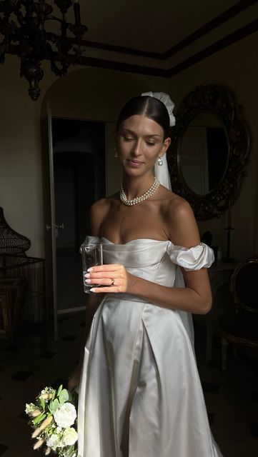 Savannah Miller Bridal on Instagram: "Memories of our bespoke bride @dcopperman wedding day and wedding dress of dreams 🤍 now referred to as ‘The Danielle’ Available now! #SavannahMillerBride #SavannahMillerBespoke #SavannahMillerBridal . . . #weddingdress #dreamwedding #weddingdestination #daniellecopperman #littlewhitedress #bridetobe #weddingplanning #overthemoon #frenchbride #bridalmakeup #bridalhair #bridalstyle #brideandgroom #weddingplanner #chicbride #influencerwedding #weddingdress #thedanielle #savannahmiller #weddingdressdesigner" Danielle Copperman Wedding Dress, Savannah Miller Wedding Dress, Wedding Dress And Pearl Necklace, Bride With Pearl Necklace, Danielle Copperman Wedding, Wedding Day Necklace, Savannah Miller Bridal, Danielle Frankel Wedding Dress, Wedding Dress With Necklace