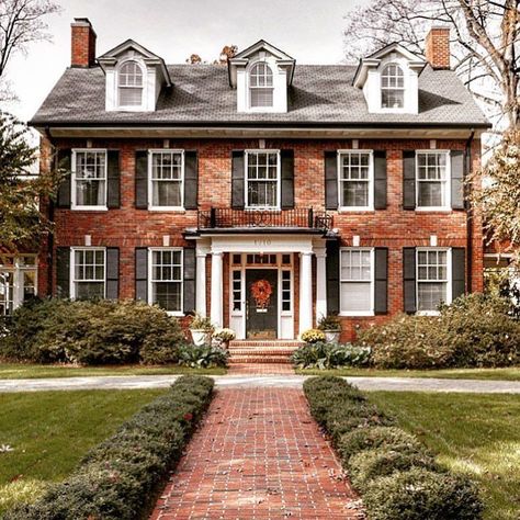 Georgian style home - gable roof - dormer windows coming out of the roof -brick home -chimneys on each end Colonial Revival Homes Exterior, Georgian Home Christmas Exterior, Colonial House Exterior Red Brick, Fall Colonial House, Red Brick Georgian House, Modern Colonial Exterior Brick, Colonial Revival House Interior, Christmas Colonial House Exterior, Colonial House Christmas Decor