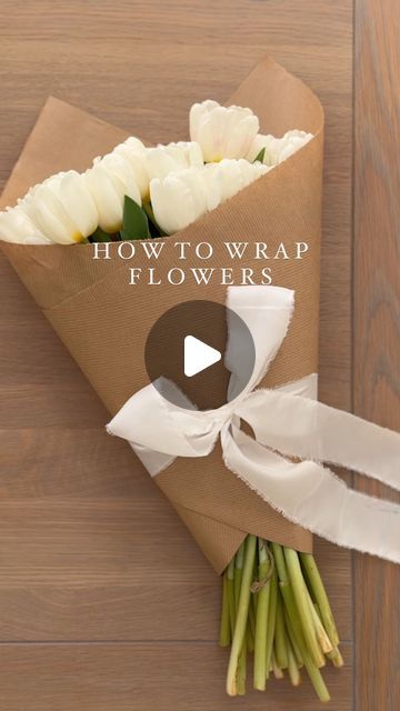 THE SUFFOLK NEST Ashlee Jane on Instagram: "How to easily wrap flowers 🤍 One to save for when you gift flowers to a loved one. #wrappingflowers #whiteflowers #tulipseason #springblooms #springflowers #tulips #tuliplove #wrapping #diywrapping #giftwrapping #giftwrap #giftwrappingideas #giftwrappingskills" How To Wrap Flowers Bouquet Gift Ideas, Flowers Wrapped In Tissue Paper, Flower Gift Wrapping Ideas, Few Flower Bouquet, How To Wrap Store Bought Flowers, Spring Gift Wrapping Ideas, Craft Paper Flower Wrapping, Wrapping Flowers With Paper, How To Wrap Flowers In Brown Paper Bag