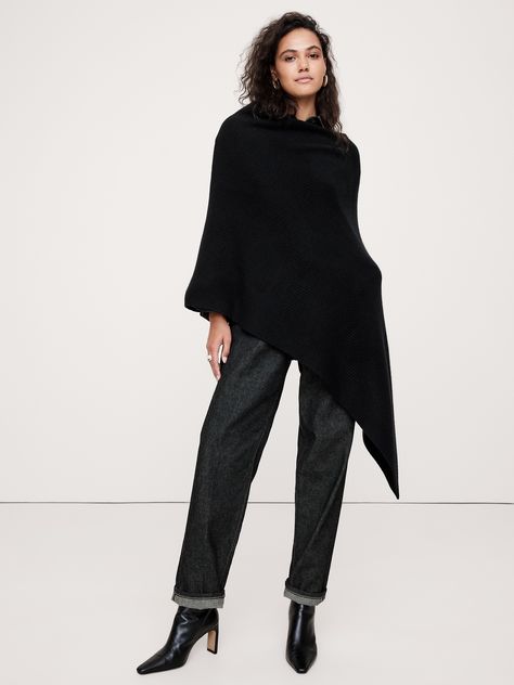 Crafted with our signature soft and warm cashmere, this poncho-style wrap is designed to layer easily.  Good Cashmere Standard™: The cashmere for this product is produced according to the Good Cashmere Standard™, which aims to improve the welfare of the cashmere goats, protect natural resources, and support local farmers. Black Poncho Outfit Classy, Black Poncho Outfit, Poncho Outfit, Support Local Farmers, Black Poncho, Sweater Poncho, Jumper Outfit, Winter Closet, Cashmere Poncho