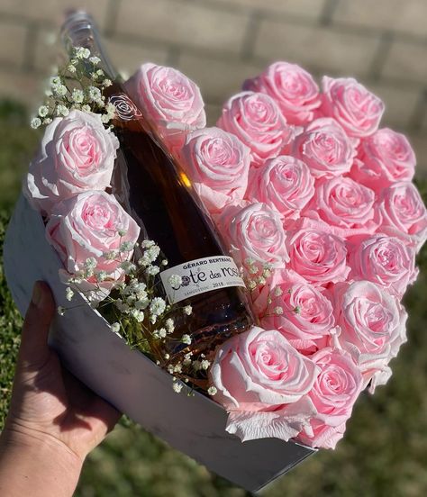 Primrose Bouquets on Instagram: “✨White Marble Heart Box✨ Filled with pink roses & a bottle of Cote des Roses Wine. 💖 DM to Order! LIMITED QUANTITIES!” Wine Bottle Bouquet, Birthday Package, Package Ideas, Birthday Packages, Bouquet Gift, Flowers Bouquet Gift, Des Roses, Instagram White, Heart Box