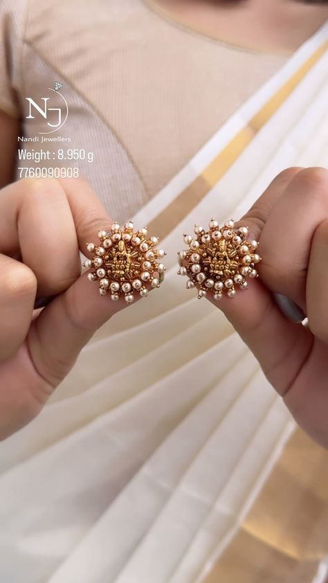 Lakshmi Pearl Ear Studs From 'Nandi Jewels' • South India Jewels Ear Studs Indian, Big Earrings Gold, Small Earrings Gold, Pearl Earrings Designs, Gold Pearl Jewelry, New Gold Jewellery Designs, Gold Earrings Models, Diamond Pendants Designs, Gold Earrings Wedding