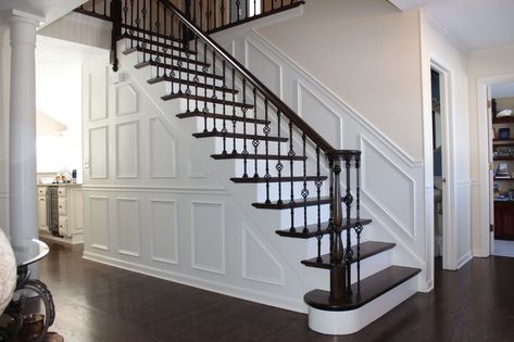 5 Stunning Stairway Trends for Your Home | The Money Pit Indoor Stair Railing, Stair Railing Makeover, Diy Staircase, Iron Stair Railing, Wrought Iron Stairs, Staircase Remodel, Iron Balusters, Staircase Makeover, Stairway Design