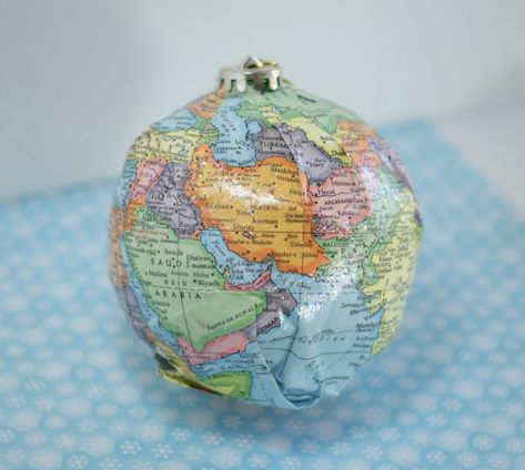 DIY Map Ornaments w/ Sparkle Mod Podge - Recycle a map to create a whimsical Christmas ornament craft. Map Crafts For Kids, Old Maps Crafts, World Map Crafts, Chair Craft, Disney Map, Pink Pirate, Jesse Tree Ornaments, Diy Map, Map Ornaments