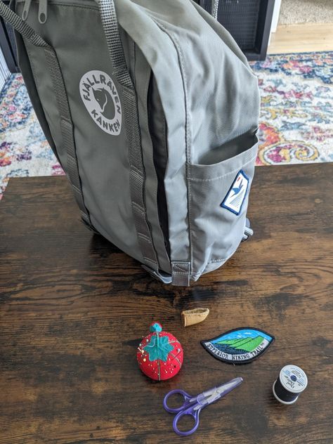 Fjallraven Backpack pictured with supplies to sew an embroidery patch on Backpack Video, Fjallraven Backpack, Sew Embroidery, Sewing Patches, Backpack Fjallraven, Bug Out Bag, Sew On Patches, How To Sew, Embroidery Patches