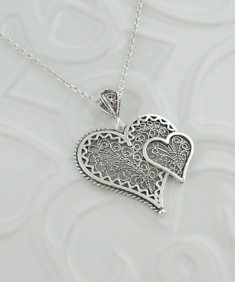 Find the perfect way to say "I ❤️ you" with our intricate 925 Sterling Silver Filigree Heart Pendant! 💞 Handcrafted with love, this elegant necklace features two hearts intertwined in a dance of devotion. Whether you're celebrating love, friendship, or self-love, this charm speaks volumes without saying a word. Ready to wear your heart on your neck? Click to ad👉 [https://nuel.ink/Ihmzci and let your love shine! ✨ #HeartToHeart #SterlingSilver #EtsyFinds Accessorize Jewellery, Pretty Jewelry Necklaces, Filigree Jewelry, Art Heart, Filigree Pendant, Heart Women, Sterling Silver Filigree, Double Heart, Silver Filigree