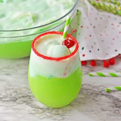 This Grinch Punch is the perfect drink for your holiday parties! Filled with the delicious flavors of lime sherbet, Sprite and Green Berry Punch, this fun Christmas drink will have everyone coming back for seconds! Grinch Punch Recipe, Grinch Recipes, Fun Christmas Drinks, Creamsicle Milkshake, Grinch Drink, Grinch Punch, Sherbet Punch, Christmas Party Drinks, Lime Sherbet