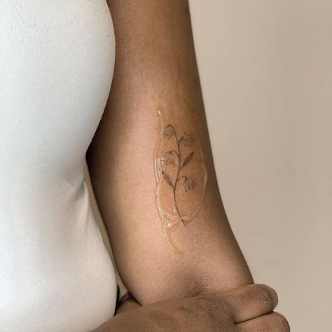 Cute Tiny Tattoo Placement, Lily Of The Valley Tattoo Side Rib, Valley Of Lily Tattoo, Tattoo Ideas Lily Of The Valley, May Lily Of The Valley Tattoo, Dainty Lily Of The Valley Tattoo, Small Dahlia Flower Tattoo, Lily Of The Valley Fine Line Tattoo, Lily Of The Valley Back Tattoo