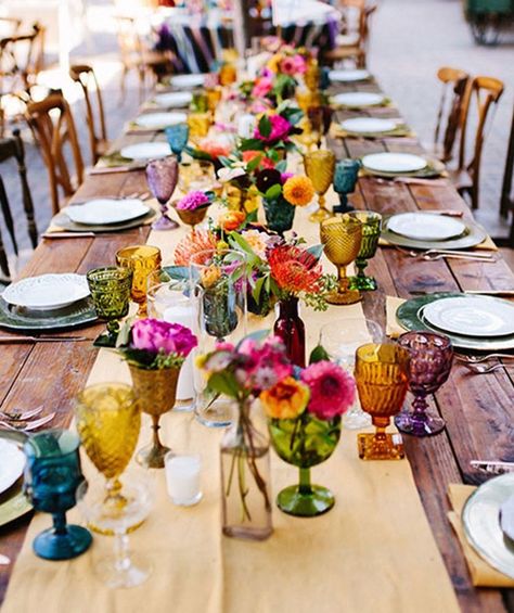 This is the detail your wedding tablescape is missing. Deco Champetre, Fiesta Wedding, Tafel Decor, Festive Wedding, Boda Mexicana, Garden Wedding Decorations, Outdoor Dinner, Ruby Wedding, Mexican Wedding