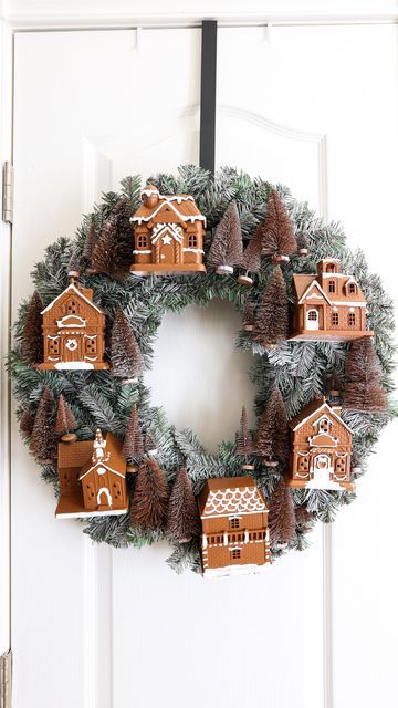 Liz Fenwick DIY on Instagram: "I was inspired by the famous Anthropologie village wreath, but I was NOT loving the $200 price tag!! 😳 So I made my own and added a gingerbread twist! 😍🎄 I got the houses from Dollar Tree and the wreath from Hobby Lobby! What do you think? Do you like the gingerbread trend?? 🤔 #dollartreediy #dollartreefinds #dollartreecrafts #dollartreecommunity #dollartreeobsessed #christmasdecor #christmasdecorating #christmaswreath #wreathdecor #diywreath" Christmas House Wreath, Diy Gingerbread Wreath, Gingerbread Wreath Diy, Gingerbread Decor Diy, Dollar Tree Gingerbread House Diy, Gingerbread Wreaths Christmas, Dollar Tree Crafts Diy Christmas Decor, Christmas Village Wreath, Mini Wreath Diy