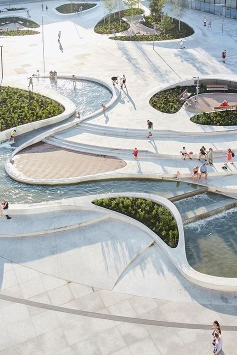 This hybrid of skatepark, playground and urbane living room is the perfect venue for a young, dynamic society. Cyclists and scooters cruise along organically curved levels, between them oases of tranquility, water features, cafes and restaurants. Learn more at Architonic.com  #architonic #architecture #landscapearchitecture #landscapedesign #parkdesign #publicspace #urbandesign #urbanarchitecture #architecturephotography Curve Building, Playgrounds Architecture, Architecture Blueprints, German Architecture, Perspective Drawing Architecture, Urban Development, Innovative Architecture, Architecture Design Sketch, Architecture Concept Drawings