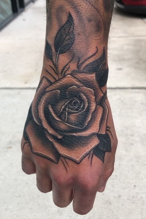 Dope Tattoos For Men, Hand Tattoo Cover Up, Black And Grey Rose Tattoo, A Rose Tattoo, Black And Grey Rose, Skull Hand Tattoo, Rose Hand Tattoo, Rose Tattoo Sleeve, Rose Tattoos For Men