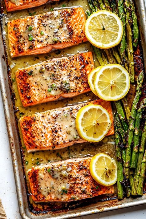 This one-pan baked garlic butter salmon is simple, quick, and delicious. It's perfect for both weeknight dinners and special occasions. Easy Salmon And Asparagus Recipes, Baked Salmon Dinner Ideas, Best Oven Baked Salmon, Baked Salmon And Shrimp, Salmon Sheetpan Dinner, Salmon And Black Beans, Salmon Side Recipes, Salmon Buffet Ideas, Easy Way To Cook Salmon