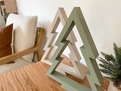 I LOVE Christmas decor. You too? Awesome. You're in the right place! I also love budget-friendly decor, which is exactly what this DIY wood Christmas tree decor is. It's fun and simple to make, and Mini Wood Christmas Trees, Small Wooden Christmas Trees, Small Wood Christmas Tree, Wood Christmas Tree Decor, Diy Wood Christmas Tree, Wood Christmas Trees Diy, Wooden Christmas Trees Diy, Wooden Xmas Trees, Christmas Tree Tutorial