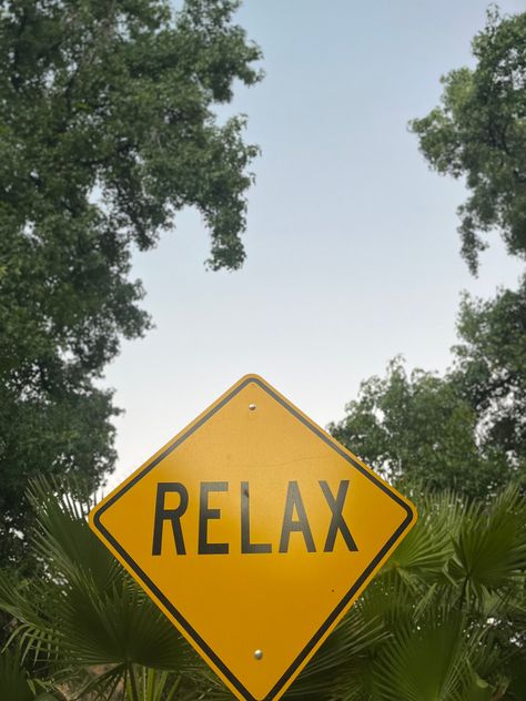 Relax sign surrounded by trees as the blue sky is seen in the background. Chill Images Aesthetic, Relaxing Asthetic Picture, Playlist Covers Chill Aesthetic, Chill Background Aesthetic, Relax Mood Aesthetic, Summer Chill Aesthetic, Chill Asthetic Picture, Chilling Aesthetic Vibes, Relaxing Vibes Aesthetic