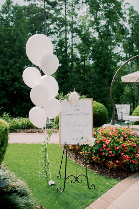 Backyard Engagement Decor, Garden Decoration For Engagement, Engagement Decorations At Garden, Decorating Ideas For The Engagement, Engagement Party At Park, Engagement Party Easel, Greenery Engagement Party Decor, White Balloons Engagement Party, Balloons For Engagement Party