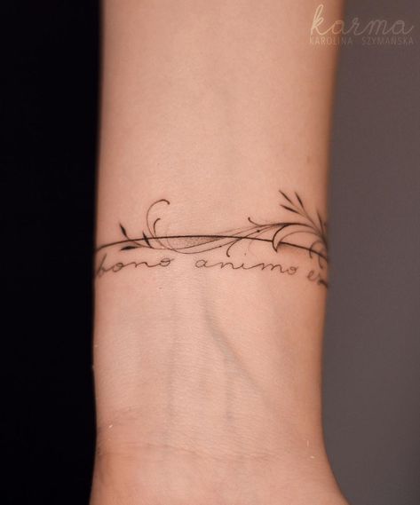 Small Armband Tattoos For Women, Womens Arm Band Tattoo Simple, Delicate Arm Cuff Tattoo, Delicate Wrist Bracelet Tattoos For Women Floral, Name Wrapped Around Arm Tattoo, Minimal Bracelet Tattoo, Word Band Tattoo, Bracelet Tattoos For Women With Name, Fineline Wrist Tattoos For Women