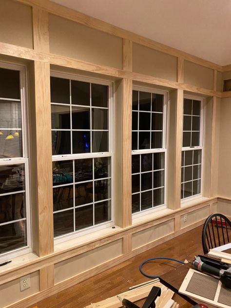 Window Millwork Ideas, Trim Between Windows, Sunroom Trim Ideas, Sunroom Window Trim, Large Window Trim Ideas Interior, Framing Around Windows, Wainscoting Around Windows, Shiplap Sunroom, Window Crown Molding