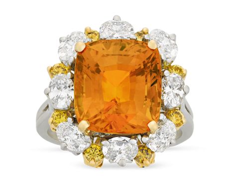 Orange Sapphire Ring by Oscar Heyman, 4.90 Carats~ An exceptionally rare 4.90-carat orange sapphire is set in this ring. The eye-catching piece was crafted by the celebrated jeweler Oscar Heyman. The firm built a reputation for impeccable jewelry, and this ring is no  exception. Fancy intense yellow and white diamonds join the gem in its platinum and 18K gold setting~ M.S. Rau Antiques Orange Sapphire Ring, Spessartite Garnet, Jaune Orange, Yellow Jewelry, Diamond Fashion Rings, Bavaria Germany, Orange Sapphire, Diamond Cocktail Rings, Garnet Ring