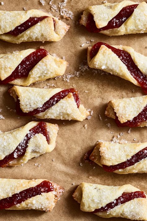 Guava and Cream Cheese Twists By Genevieve Ko YIELDAbout 50 cookies TIME1 1/2 hours, plus 2 hours’ chilling Save to Recipe Box EmailShare on PinterestShare on FacebookShare on Twitter Anna Williams for The New York Times In Puerto Rico and other parts of the Caribbean, pastelillos (also known as pastelitos) are flaky pastry turnovers that taste like bliss when eaten fresh from the bakery, their jammy guava centers fused with creamy cheese. These cookies capture a bit of that magic in packable Guava And Cream Cheese, Guava Paste, Cheese Twists, Twisted Recipes, Paste Recipe, Cream Cheese Eggs, Nyt Cooking, Flaky Pastry, Creamy Cheese