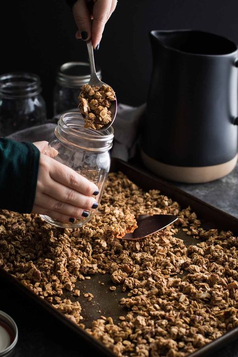 Spooning baked crunchy chai spiced granola from the pan into jars Chai Spice Granola, Granola Recipe Homemade, Jelly Roll Pan, Chai Spice, Granola Recipes, Food Items, How To Dry Basil, Granola, Food Blogger