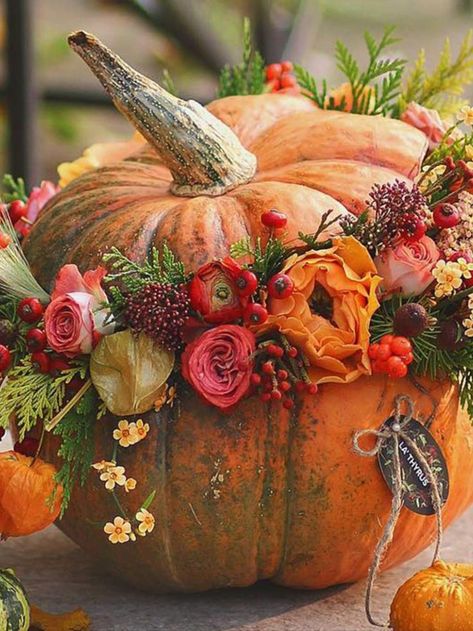 Pumpkin decorating ideas: floral centrepiece Urn Pumpkin Decor, Pumpkin Arrangements, Thanksgiving 2024, Fall Flower Arrangements, Halloween Flowers, Fall Floral Arrangements, Fall Entertaining, Pumpkin Flower, Fall Arrangements