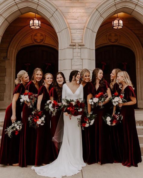 These burgundy velvet bridesmaid dresses from Jenny Yoo are stunning for a fall or winter wedding. The flutter sleeves, open tie back, and deep-v details on these bridesmaid dresses complemented the bride's simple long-sleeve wedding dress perfectly. Pair with burgundy and white wedding bouquets for a holiday wedding. Click for more burgundy bridesmaid dresses we love. // Photo: Madalynn Young Photography, Florals: Billie Bill Co, and Dresses: Jenny Yoo Christmas Wedding Themes, Winter Wedding Bridesmaids, Christmas Wedding Inspiration, Velvet Bridesmaid, Winter Bridesmaids, Winter Bridesmaid Dresses, Velvet Bridesmaid Dresses, Burgundy Bridesmaid, Winter Wedding Colors