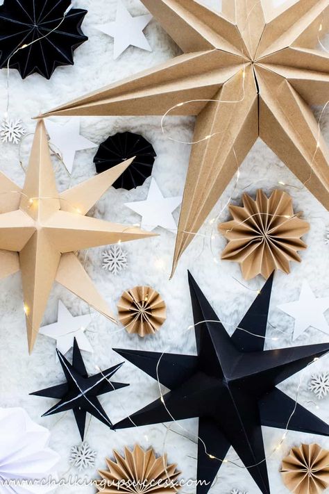 Today, I'm sharing how to make 3D paper stars in an easy, step-by-step tutorial. Learn how to make 8 pointed, 3D paper star decorations for your house or to use as gift hangers. Three-dimensional paper stars are simple to make and look amazing grouped together in different sizes. Add some string for hanging your paper star or simply place them on a shelf amongst your other Christmas ornaments. Paper Stars With Lights, Origami Stars Christmas, Paper Star For Christmas Tree Topper, 3d Star Decoration, Diy 8 Point Paper Star, Scandi Paper Stars Diy, Hanging Stars Decorations Diy, Three Dimensional Paper Stars, 3d Paper Decorations