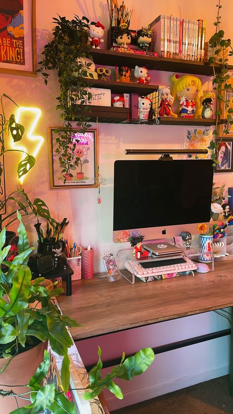 Art studio home office desk setup anime and studio ghibli inspired Pc Living Room Setup, Gaming And Art Setup, Indie Office Decor, Desk Setup Artist, Small Art Desk Setup, Desk Setup Maximalist, Colorful Gaming Setup, Japanese Desk Setup, Cute Gamer Setup