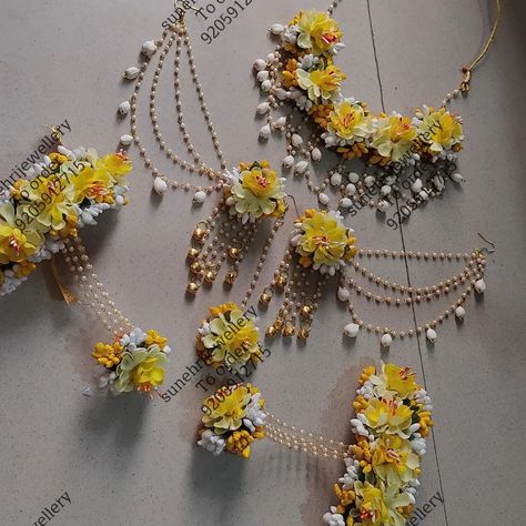 Blend of tradition and style is this set  Beautiful yellow white flowers with Jasmin bud touch in earrings and necklace  www.sunehrijewellery.com For order or enquiry Whatsapp us 9205912715 link in bio Or order from our website  . . . . . . ...  . . .   .  .  . . . . . #shelljewellery #floraljewellery #flowerjewellery #floraljewelry #indianwedding #haldijewellery #floraljewelleryformehendi #floraljewelleryforhaldi #bridalfloraljewellery #bridaljewellery #gotajewellery #wedmegood #wedding #f... Haldi Jewellery, Yellow White Flowers, Haldi Outfit, Fancy Jewellery Designs, Indian Bridal Dress, Earrings And Necklace, Fancy Jewellery, Dance Fashion, Floral Jewellery