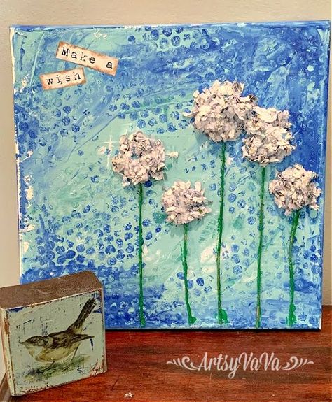 I love mixed media art projects. This one is fun and easy enough for any age. And, while you're at it, you're recycling paper from your shredder!I started by adding 3 colors of Dixie Belle Paint to a 12" x 12" canvas. I used the colors Mermaid Tail, Sea Glass, & Haint Blue. Acrylic paint would work great for this project too. I used an old hotel key card to spread the paint around on the canvas. Don't overwork it or you'll just mix the colors together & get one color. While the can… One Is Fun, Recycling Paper, Hotel Key Cards, Haint Blue, Mixed Media Art Projects, Bee Crafts, Dixie Belle Paint, Recycled Art, Mermaid Tail