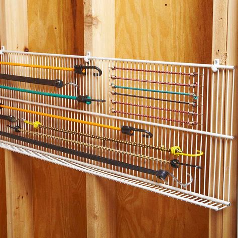 Brilliant bungee cord storage Bungee Cord Storage, Garage Organization Tips, Storage Shed Organization, Garage Workshop Organization, Shed Organization, Garage Organization Diy, Tool Storage Diy, Basement Storage, Bungee Cords