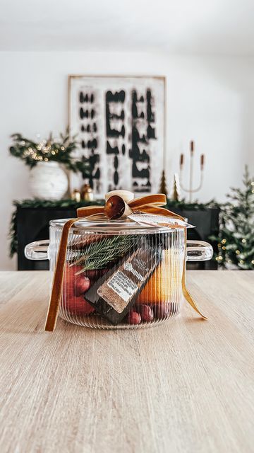 733K views · 30K likes | Jen Alvarez • Home Decor on Instagram: "Stovetop potpourri gift idea 🎁 comment “hostess” to get the link to shop this post straight to your inbox 🤍 This gift idea would be so cute as a hostess gift this holiday season or as a sweet housewarming gift. here’s what I used: + $25 glass pot + orange, small apples, rosemary, cranberries, vanilla, cinnamon and anise + velvet ribbon and printable tag Shop this post in my bio on my @shop.LTK // link in bio https://liketk.it/4mOsF #Itkgiftguide #Itkgiftspo #Itkhome #Itkholiday #Itkunder50 #hostessgift #christmasdecor #holidaydecor #christmaspartyideas #holidayhostess #holiday #liketkit#amazonfinds #amazonmusthaves #amazonhome #kitchendecor #kitchenfinds #giftideas #itkunder100" Homemaker Christmas Gifts, Holiday Gift Ideas For Neighbors, Thanksgiving Hosting Gift Ideas, Stove Top Popurri Gift, Hostess Christmas Gift Ideas, Hostess Gift Ideas Thanksgiving, Hosting Gifts Ideas, Christmas Work Gifts, Best Hostess Gift Ideas