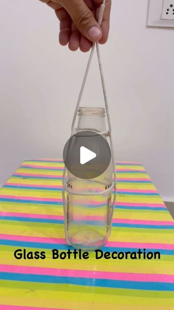 Jagwant Singh on Instagram: "Glass Bottle Decoration and Easy Hanging #decoration #decor #homedecor #interiordesign #design #interior #home #art #deco #handmade #architecture #homedesign #furniture #homesweethome #d #love #interiors #inspiration #decorationinterieur #wedding #vintage #homedecoration #luxury #instagood #interiordesigner #designer #style #interiordecor #o #livingroom" Macrame Hanging Bottle, Glass Bottle Hanging Ideas, Bottle Hanging Plants, Hanging Bottles Decoration, Hanging Glass Bottles, Repurpose Wine Bottles, Hanging Bottles, Glass Bottle Decoration, Glass Bottle Decor