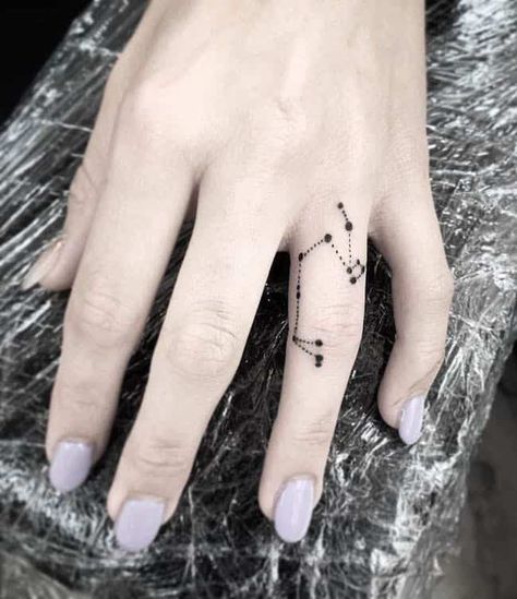 68 Unique Small Finger Tattoos With Meaning - Our Mindful Life Leo Finger Tattoos For Women, Small Gemini Tattoo For Women Finger, Scorpio Finger Tattoos For Women, Capricorn Finger Tattoos For Women, Scorpio Finger Tattoo, Astrology Finger Tattoos For Women, Constellation Finger Tattoo, Gemini Finger Tattoos For Women, Star Sign Finger Tattoo