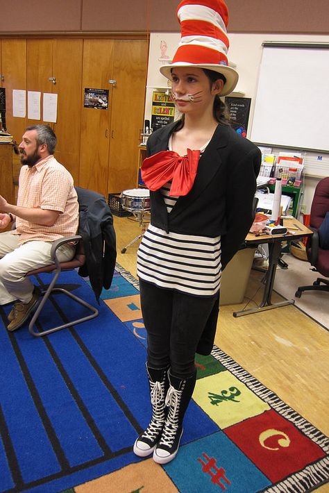 Seussical, Jr. Costumes-- my Cat in the Hat costume:  Black coat w/tails, striped tee, red satin bow, black skinny jeans, Converse boots, classic Seuss hat Cat In The Hat Costume, Seussical Jr, Seussical Costumes, Cat Costume Kids, Creative Halloween Costumes Diy, Converse Boots, Jeans Converse, Book Week Costume, Cats Musical