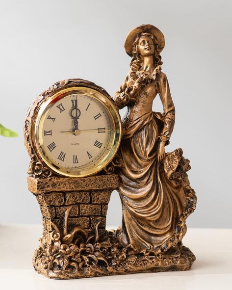 𝓐𝓷 𝓔𝓶𝓹𝓸𝓻𝓲𝓾𝓶 𝓸𝓯 𝓣𝓻𝓮𝓪𝓼𝓾𝓻𝓮𝓼 Our striking clocks not only keep perfect time but also look extremely regal. Inspired by #victorian design, our stunning clocks will make an impressive impact on your table tops 🕰️ #tabletop #clock #tableclock #figurine #figurines #clocks #tableclocks Table Clocks, Table Clock, Table Tops, Clock, Figurines, Design