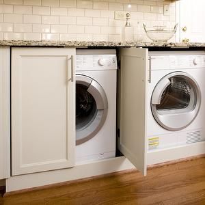 Twin Companies - laundry/mud rooms - hidden laundry room, hidden washer and dryer, shaker cabinets, laundry room, laundry room cabinets, granite counters, granite countertops, subway tiles, subway tile backsplash, Hidden Laundry Rooms, Laundry In Kitchen, Cottage Laundry, Utility Sinks, Hidden Laundry, Basement Laundry Room, Basement Laundry, Laundry Room Layouts, Diy Basement