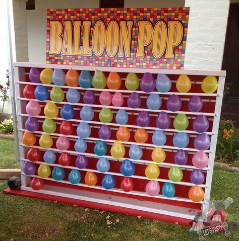 The biggest Balloon Pop Carnival Game available in Northern California, San Francisco, San Jose, Santa Clara, East Bay, Santa Cruz-Monterey Bay Area. This Mega Balloon Pop Carnival Game is a custom-made game that is a blast to play. We provide the balloon pump and a bag of 720 balloons as well as 6 bags to... School Carnival Games, Carnival Booths, Carnival Games For Kids, Carnival Birthday Party Theme, Fall Carnival, Diy Carnival, Festival Games, Circus Carnival Party, Circus Theme Party